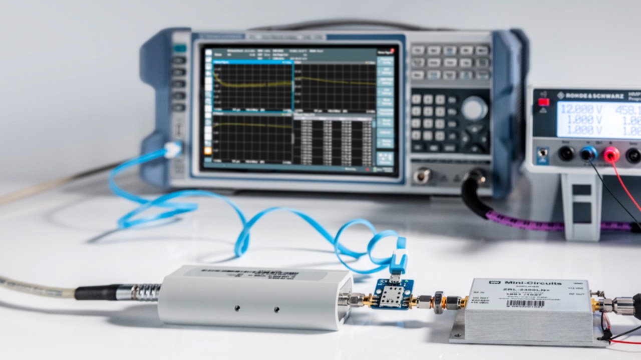 Measuring amplifier noise figure with R&S®ZNL (back), an R& S®FS-SNS18 (left) and an external pre-amplifier (right) powered by an R&S®HMP2030 programmable power supply (back right).